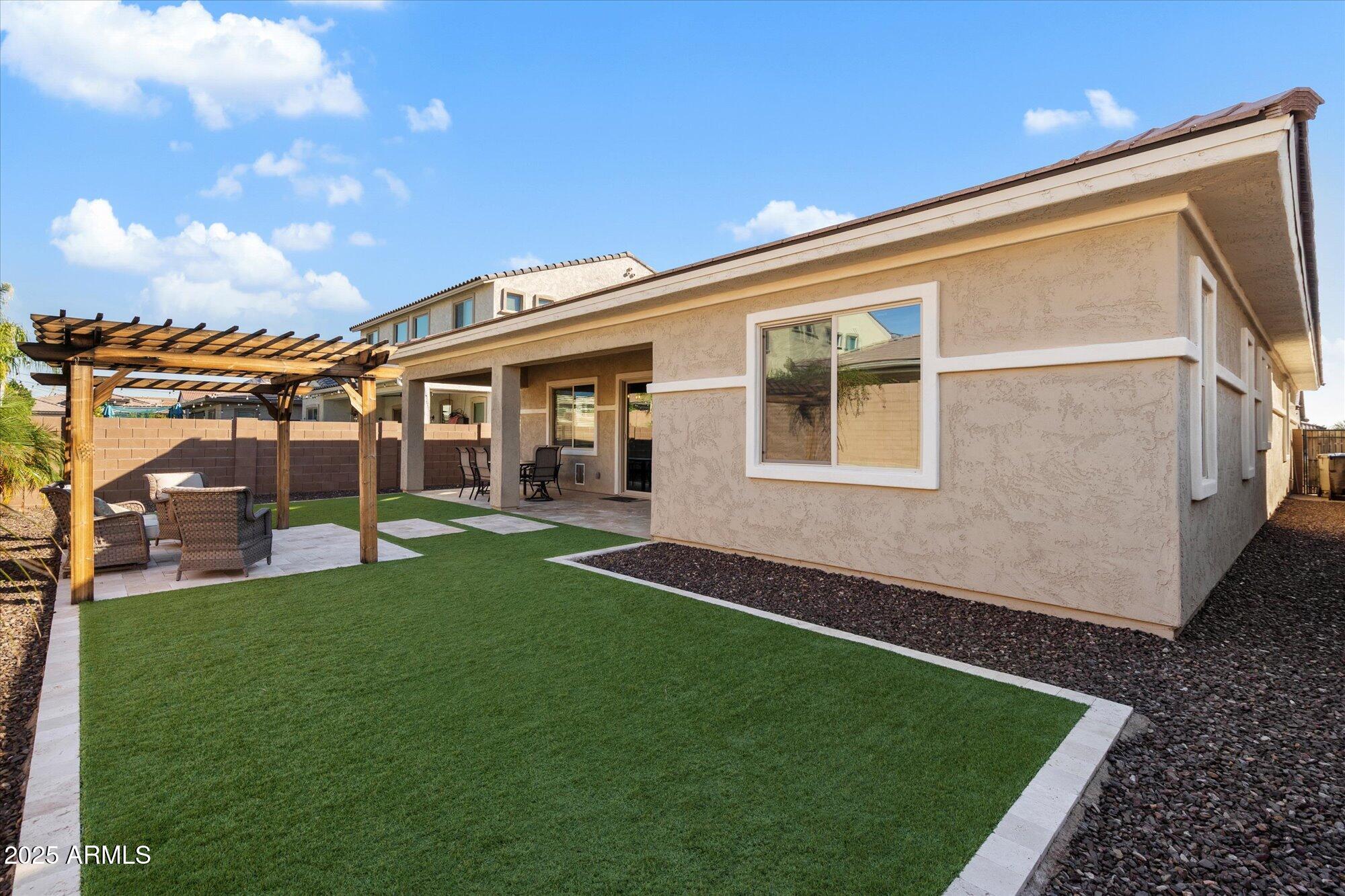 7424 West Jasmine Trail Peoria, AZ 85383 - Photo 28 of 30 a view of a house with a backyard