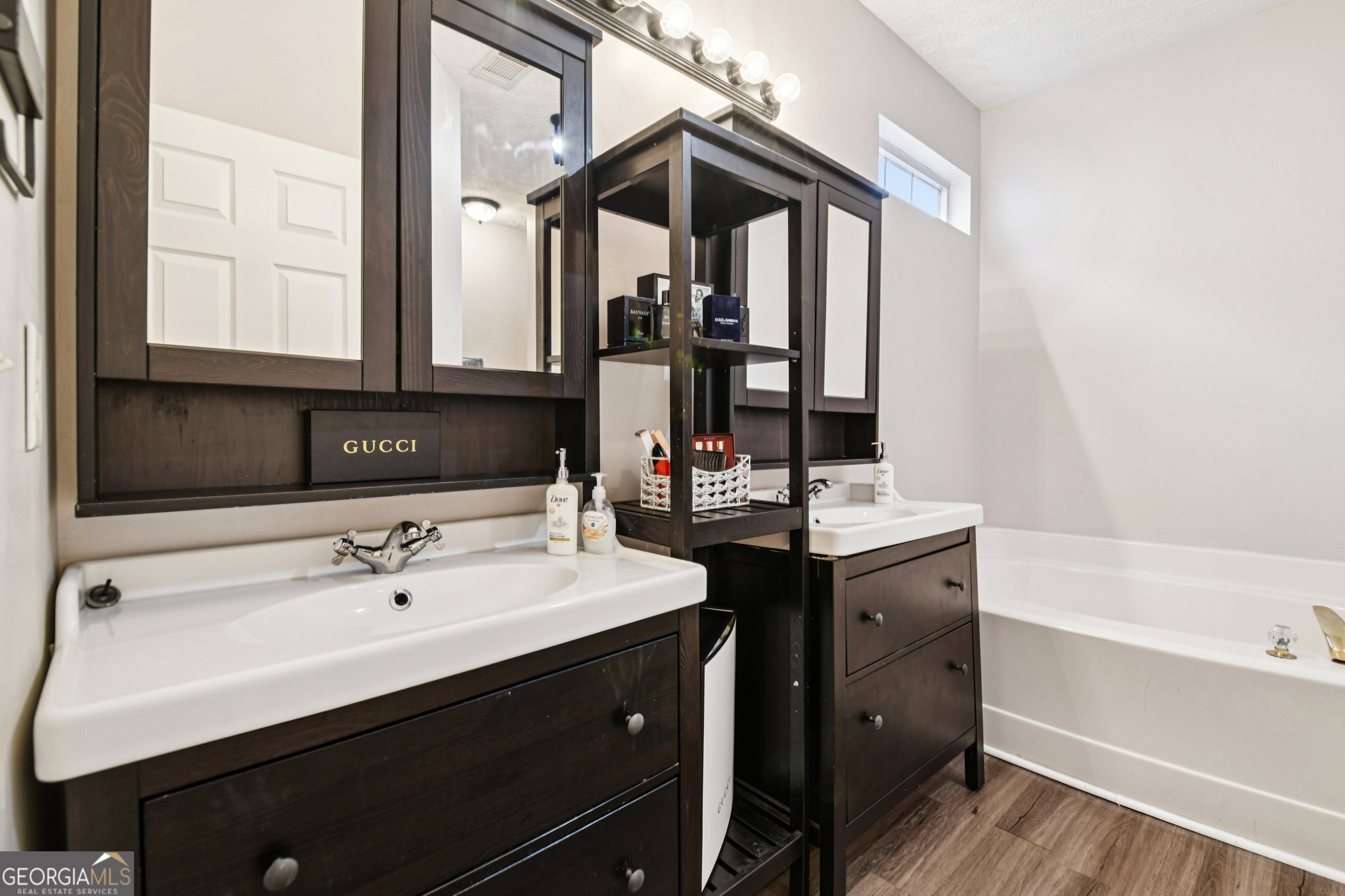 564 Goldfinch Way Stockbridge, GA 30281 - Photo 20 of 31 a bathroom with a sink and a mirror