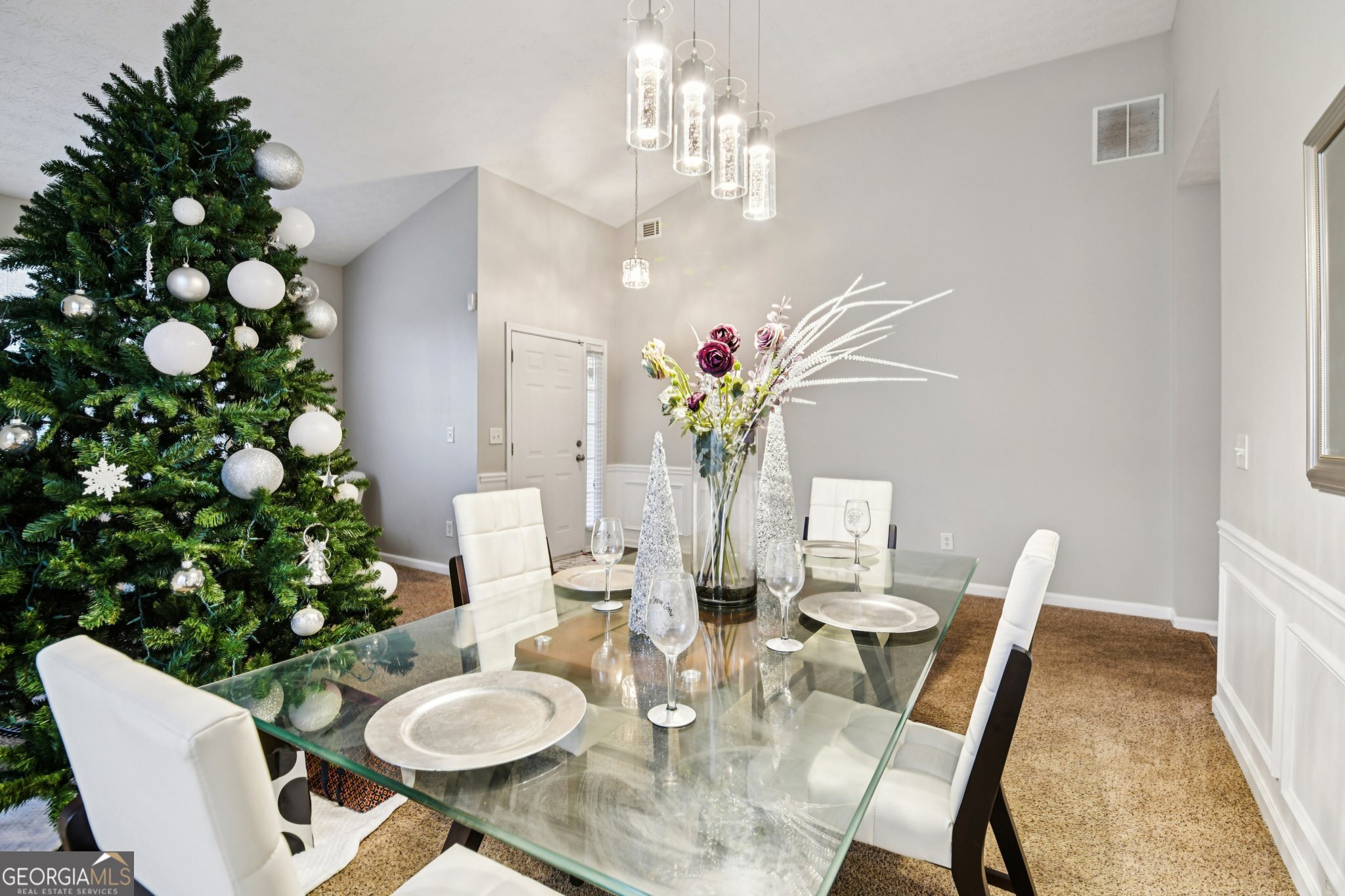 564 Goldfinch Way Stockbridge, GA 30281 - Photo 5 of 31 a view of a dining room with furniture and wooden floor
