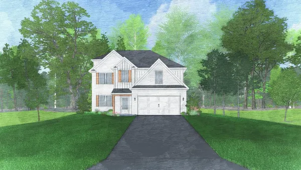 a front view of a house with a yard and trees