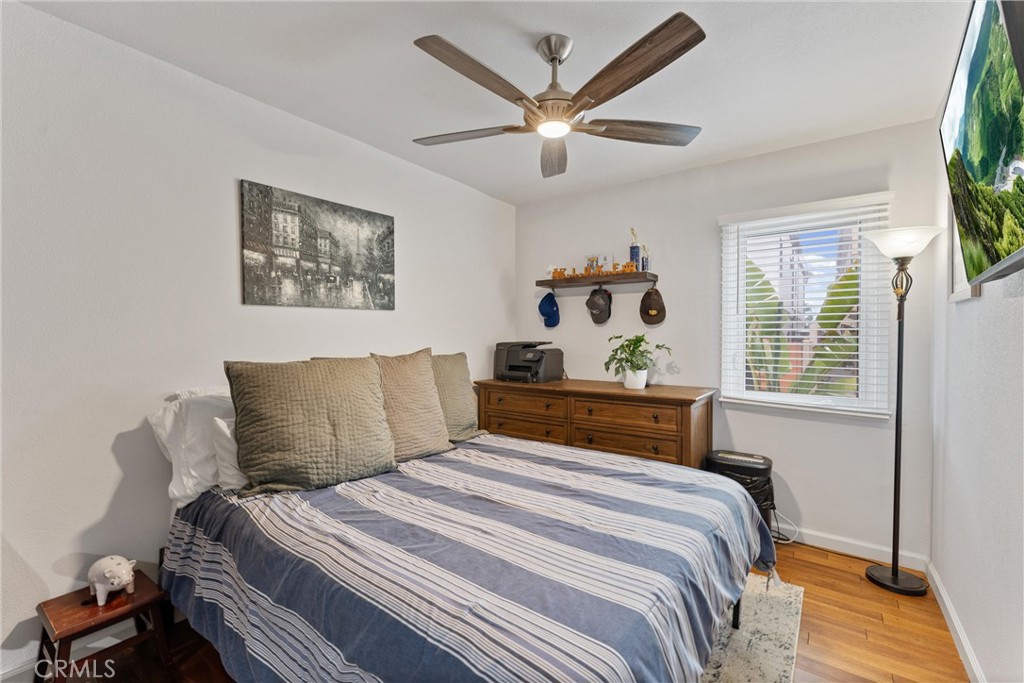 280 Tivoli Drive Long Beach, CA 90803 - Photo 12 of 22 a bedroom with a large bed and a large window