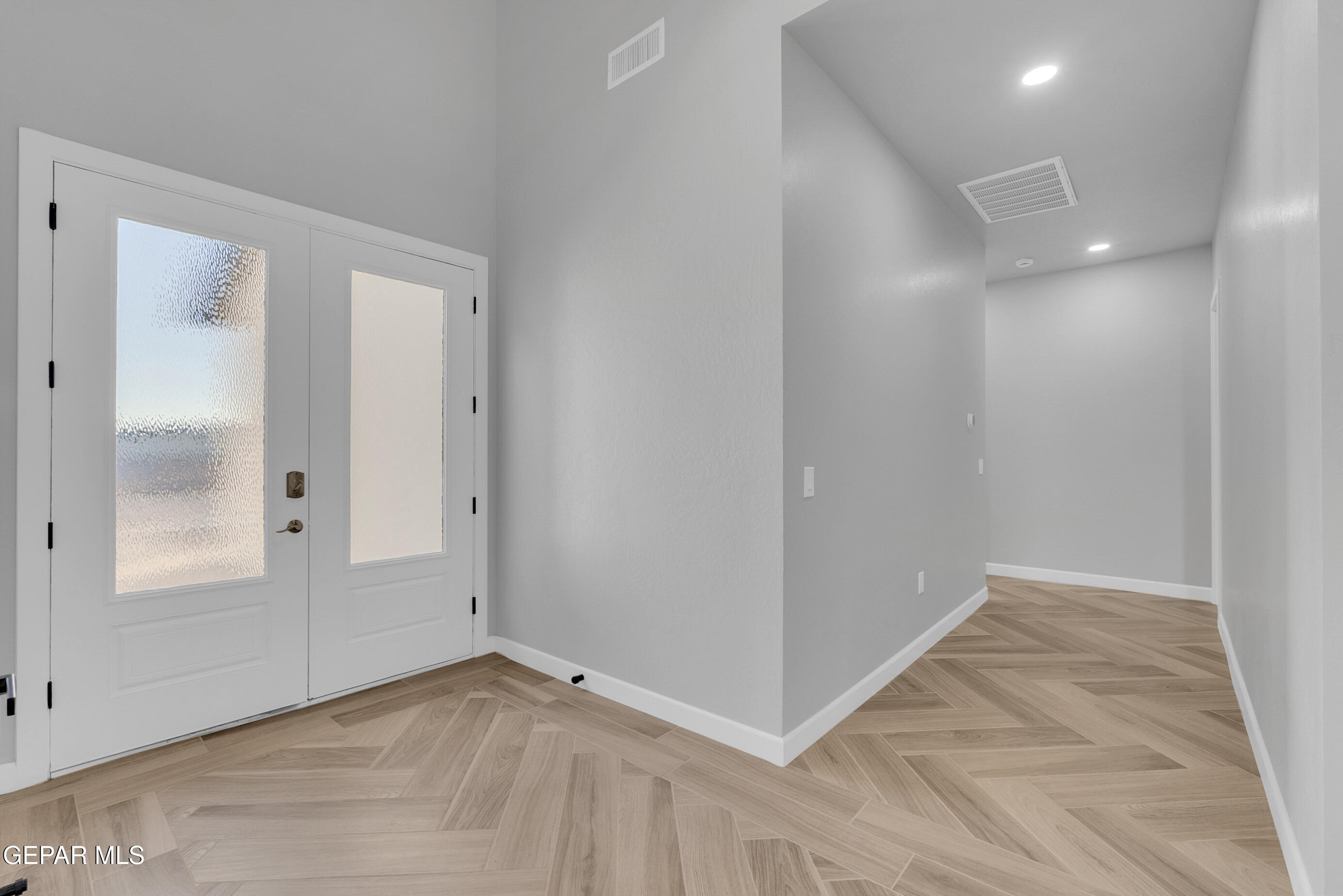 5612 Rio Bonito Circle El Paso, TX 79932 - Photo 6 of 79 wooden floor in an empty room with a window