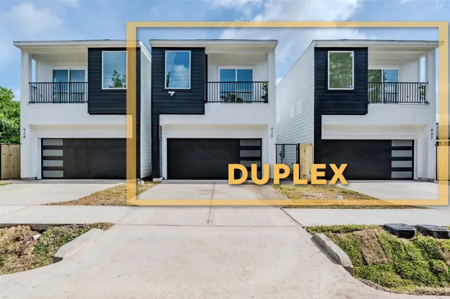 a front view of a house with yard