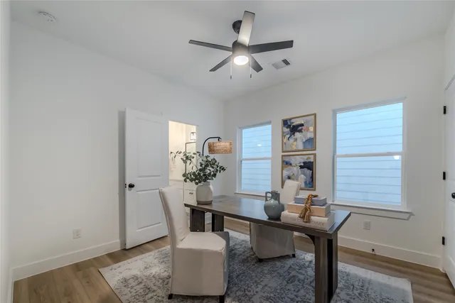 a view of a dining room with furniture