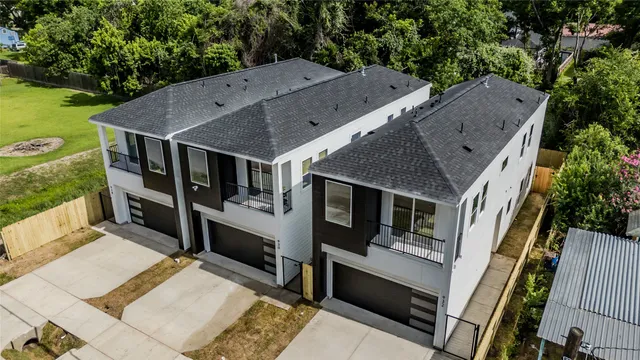 an aerial view of a house roof deck