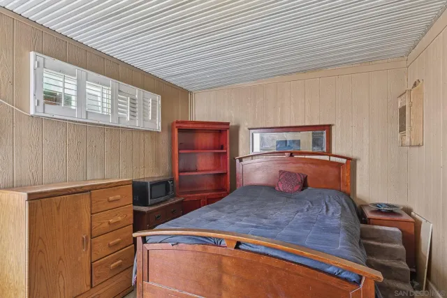 a view of backyard with outdoor seating