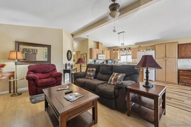 a view of a livingroom with furniture and wooden floor
