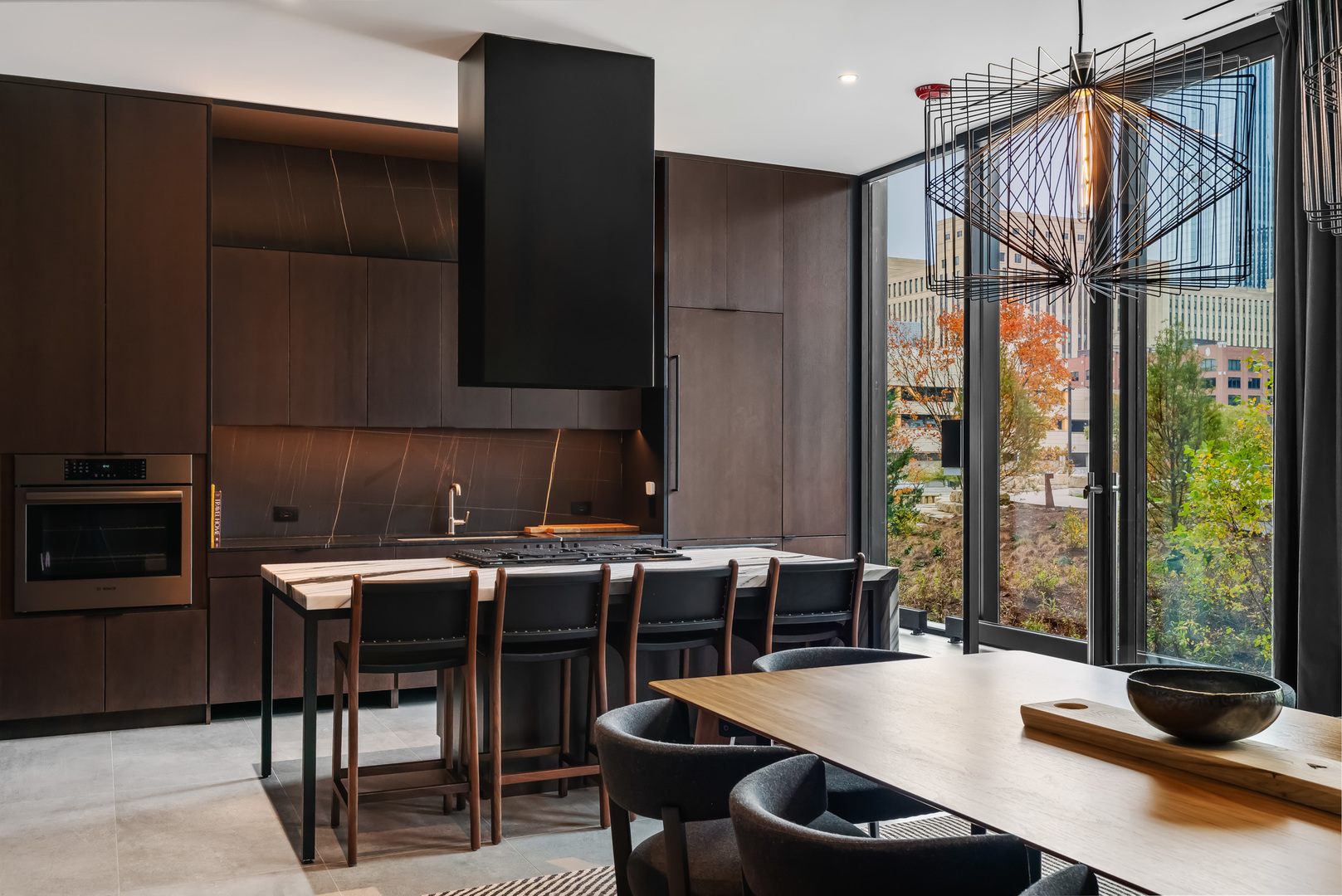 234 West Polk Street, Unit 3503 Chicago, IL 60607 - Photo 26 of 36 a kitchen with a table chairs and entryway