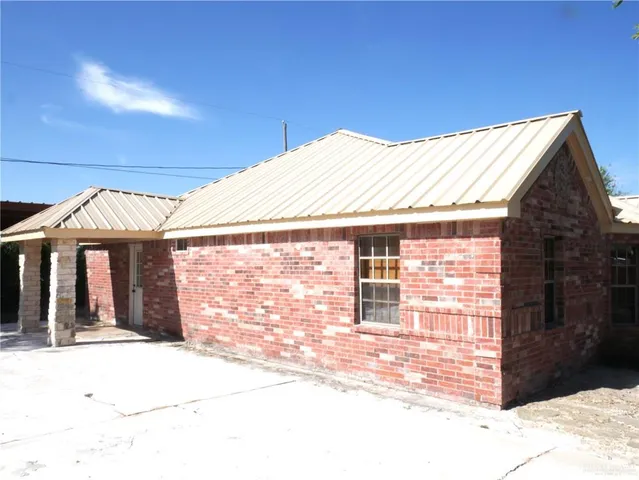 a front view of a house with a garage