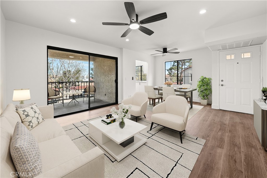 2554 Olive Drive, Unit 84 Palmdale, CA 93550 - Photo 7 of 21 a living room with furniture and wooden floor