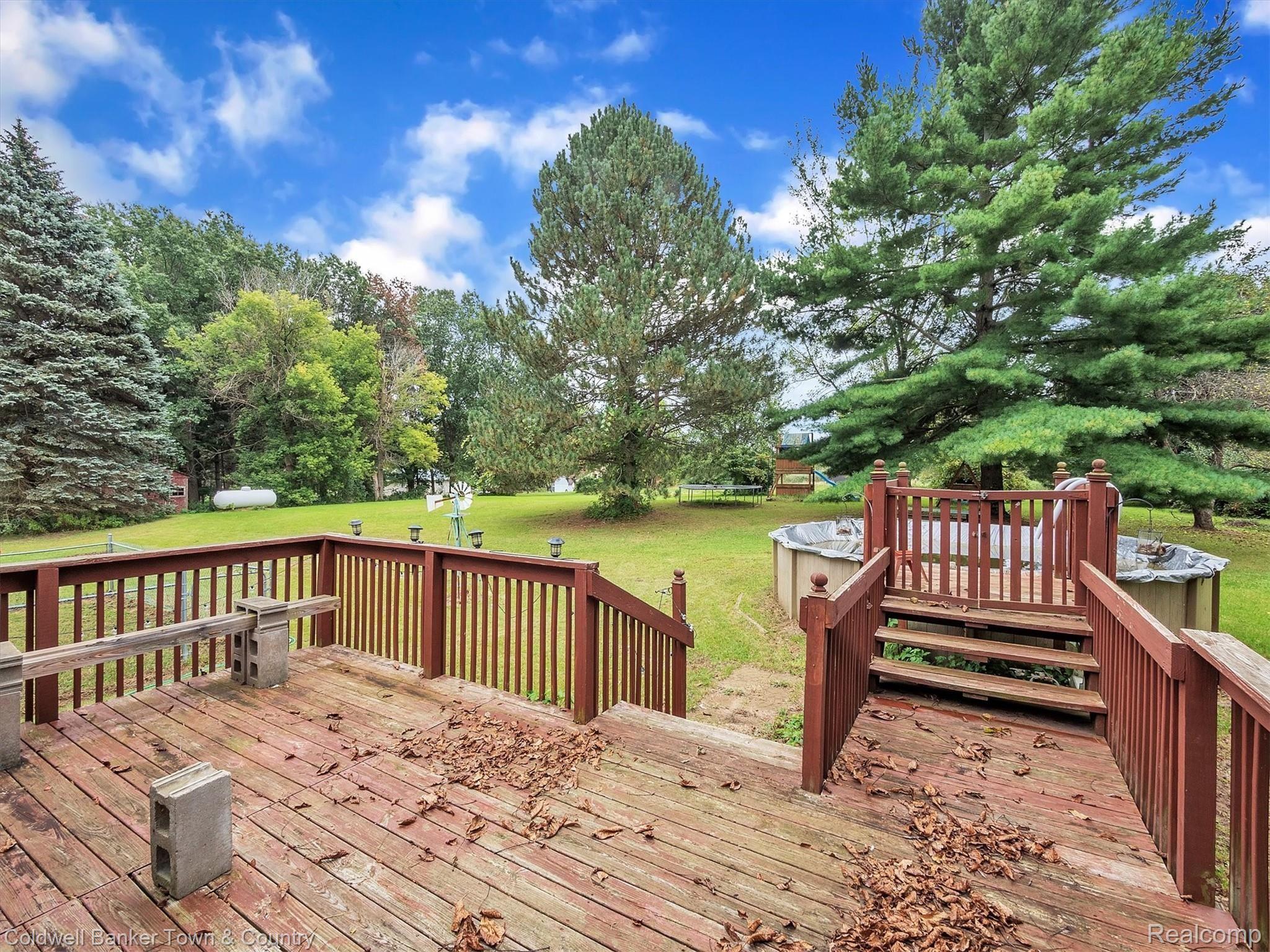 5432 Evans Road Holly, MI 48442 - Photo 37 of 39 Large deck off of Dining Room