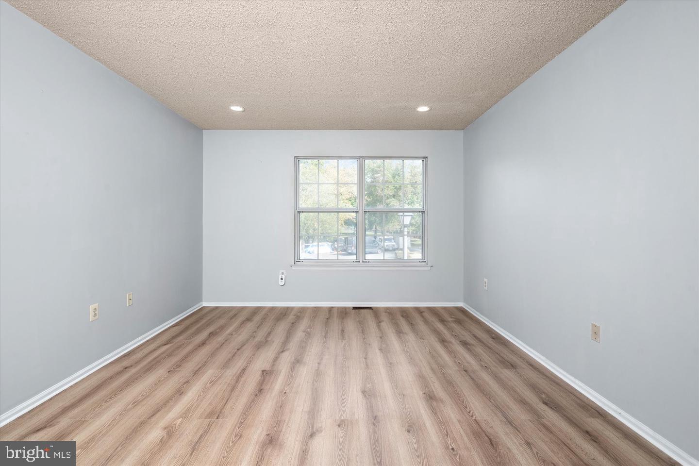 110 Versailles Court Hamilton, NJ 08619 - Photo 14 of 19 a view of room with window and hardwood floor