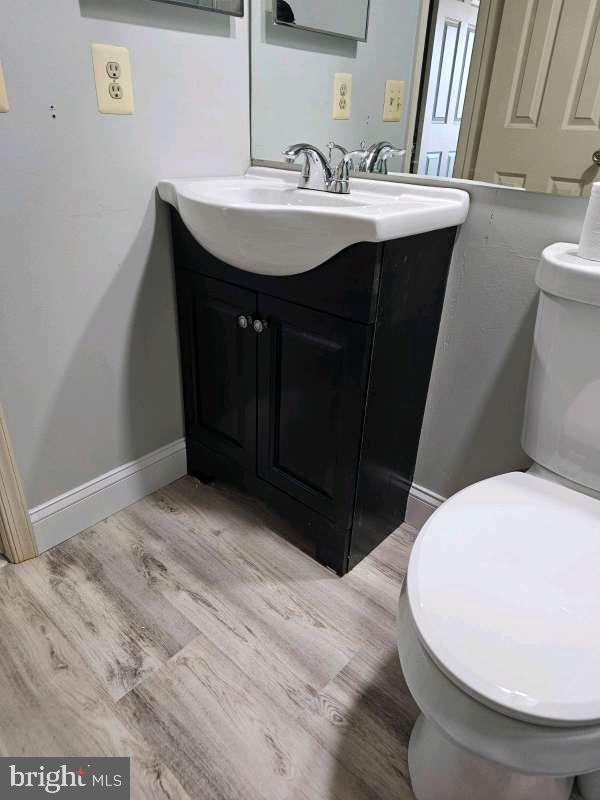110 Versailles Court Hamilton, NJ 08619 - Photo 17 of 19 a bathroom with a sink and a mirror