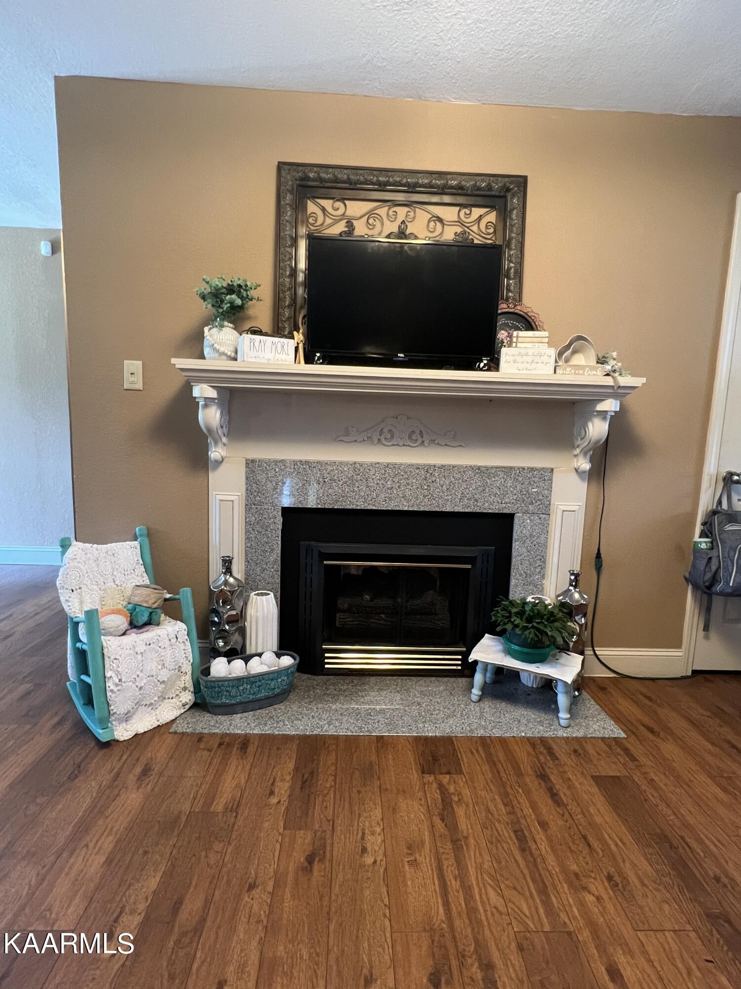 502 Claiborne Road La Follette, TN 37766 - Photo 11 of 28 a living room with furniture and a fireplace