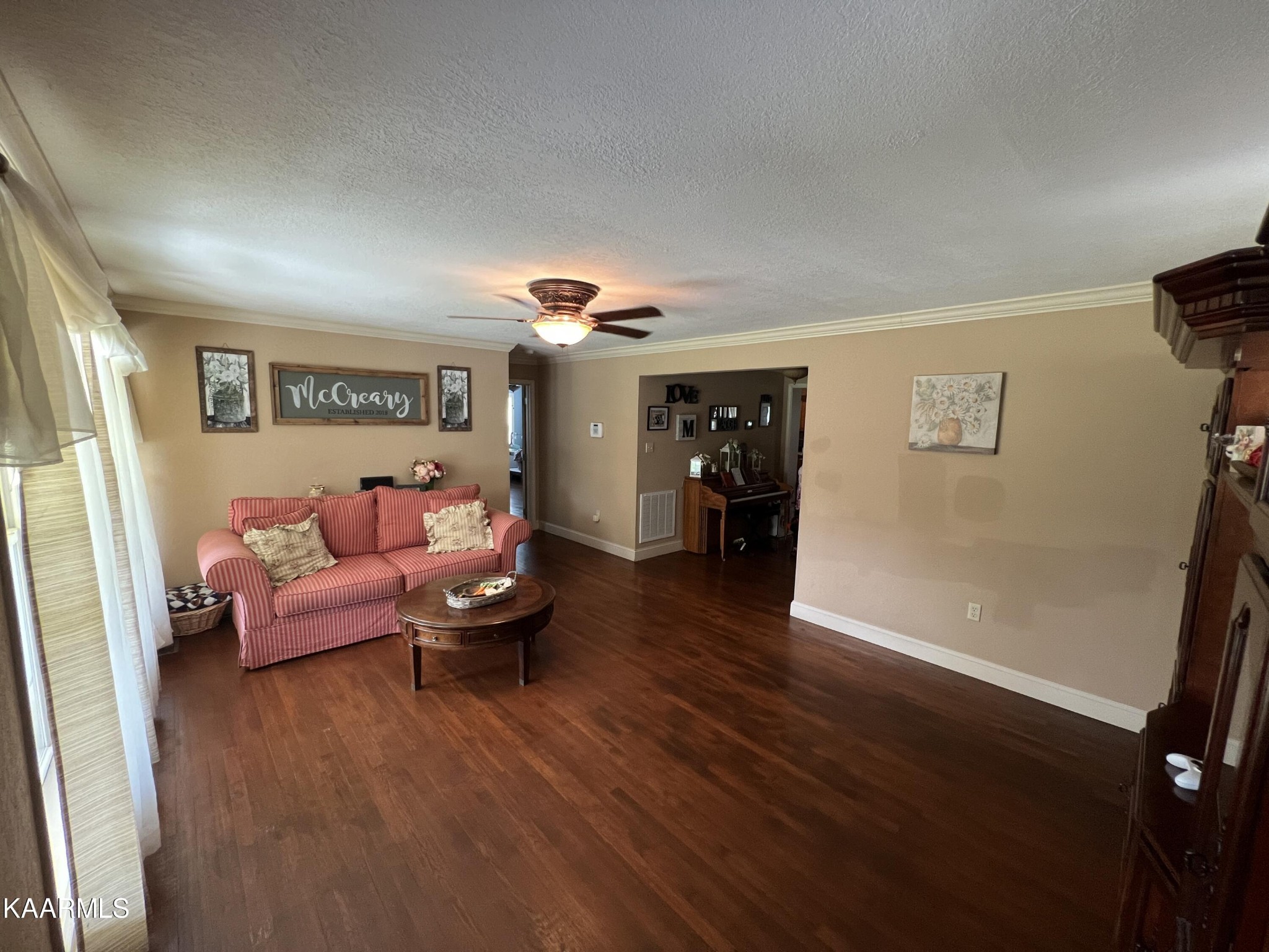 502 Claiborne Road La Follette, TN 37766 - Photo 23 of 28 a living room with furniture and wooden floor