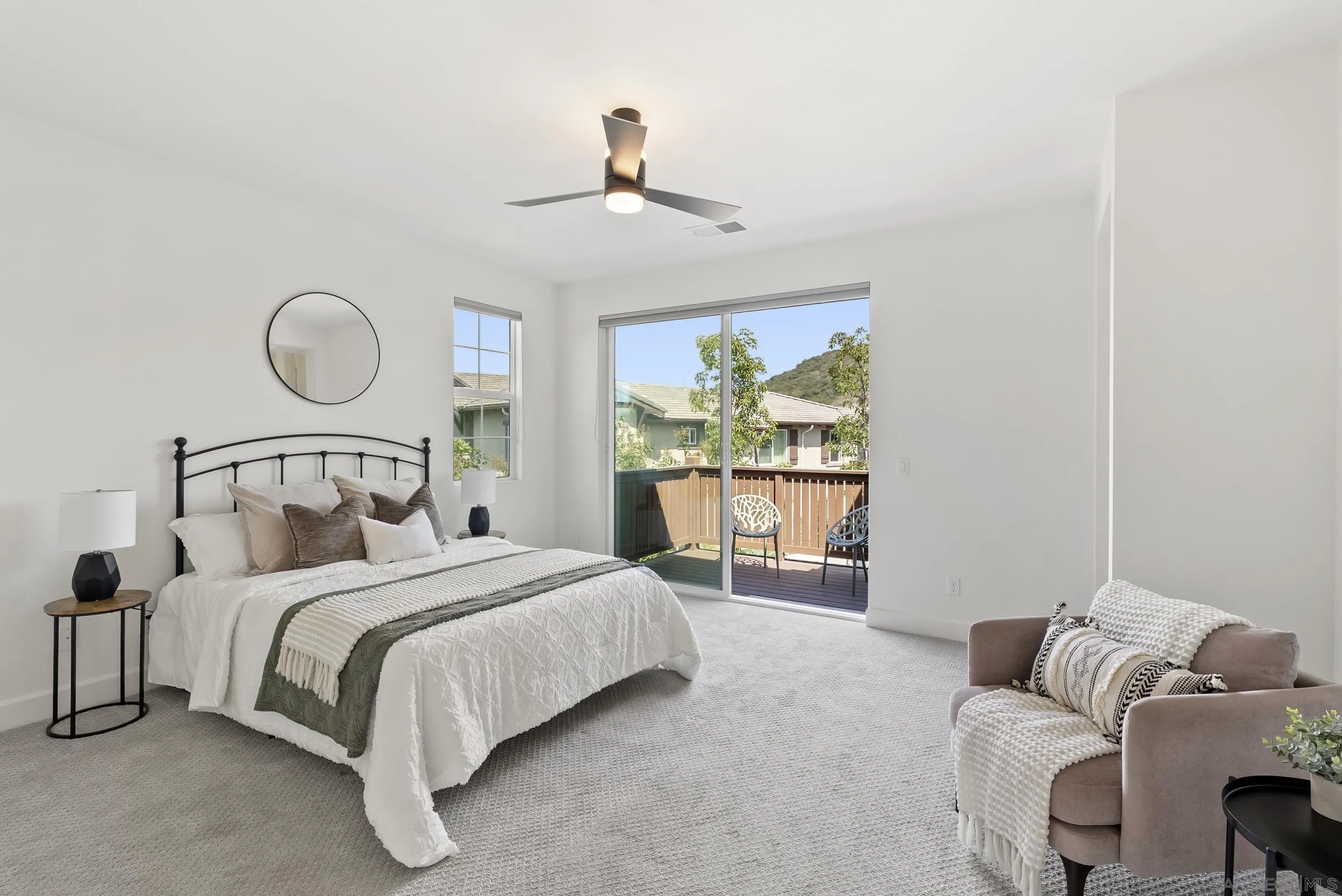 3304 Telaga Road Carlsbad, CA 92010 - Photo 22 of 60 a bedroom with a large bed and a window