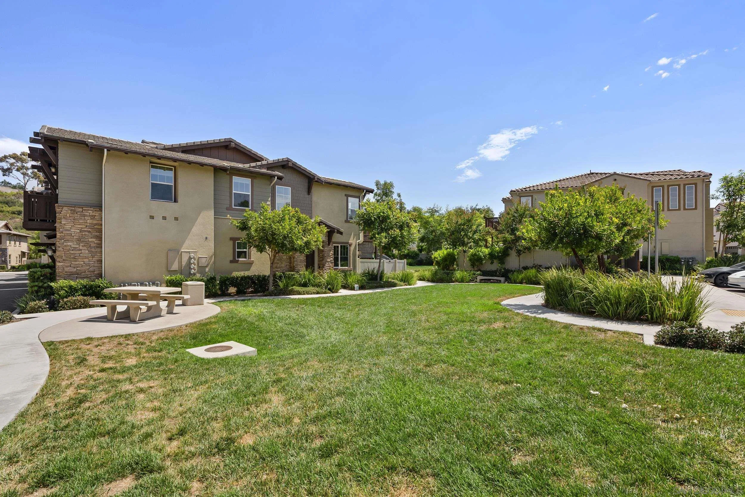 3304 Telaga Road Carlsbad, CA 92010 - Photo 43 of 60 a front view of house with yard and green space