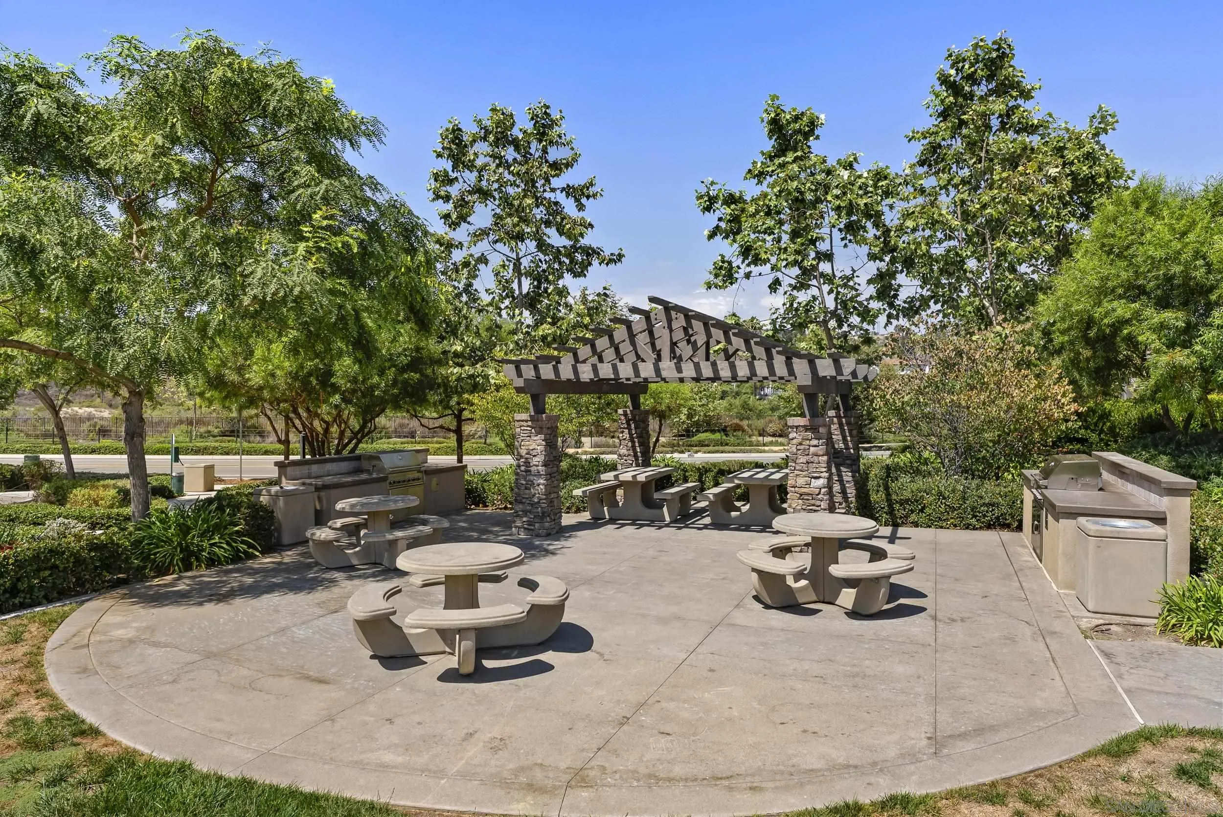 3304 Telaga Road Carlsbad, CA 92010 - Photo 47 of 60 a view of a patio with a table and chairs
