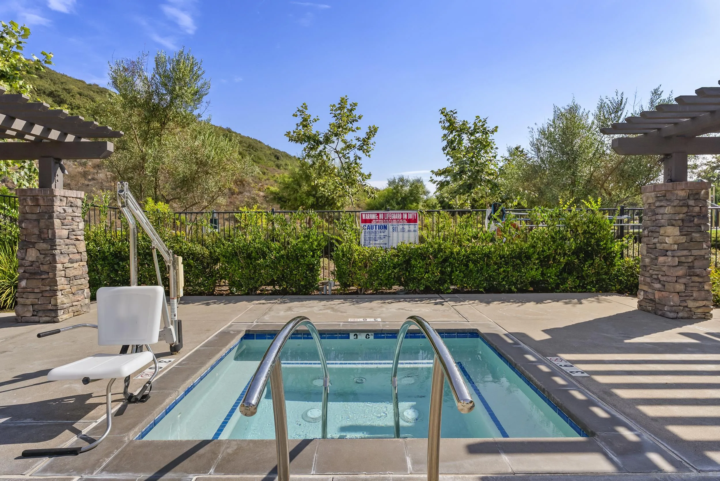 3304 Telaga Road Carlsbad, CA 92010 - Photo 49 of 60 a view of a tennis ground with large trees