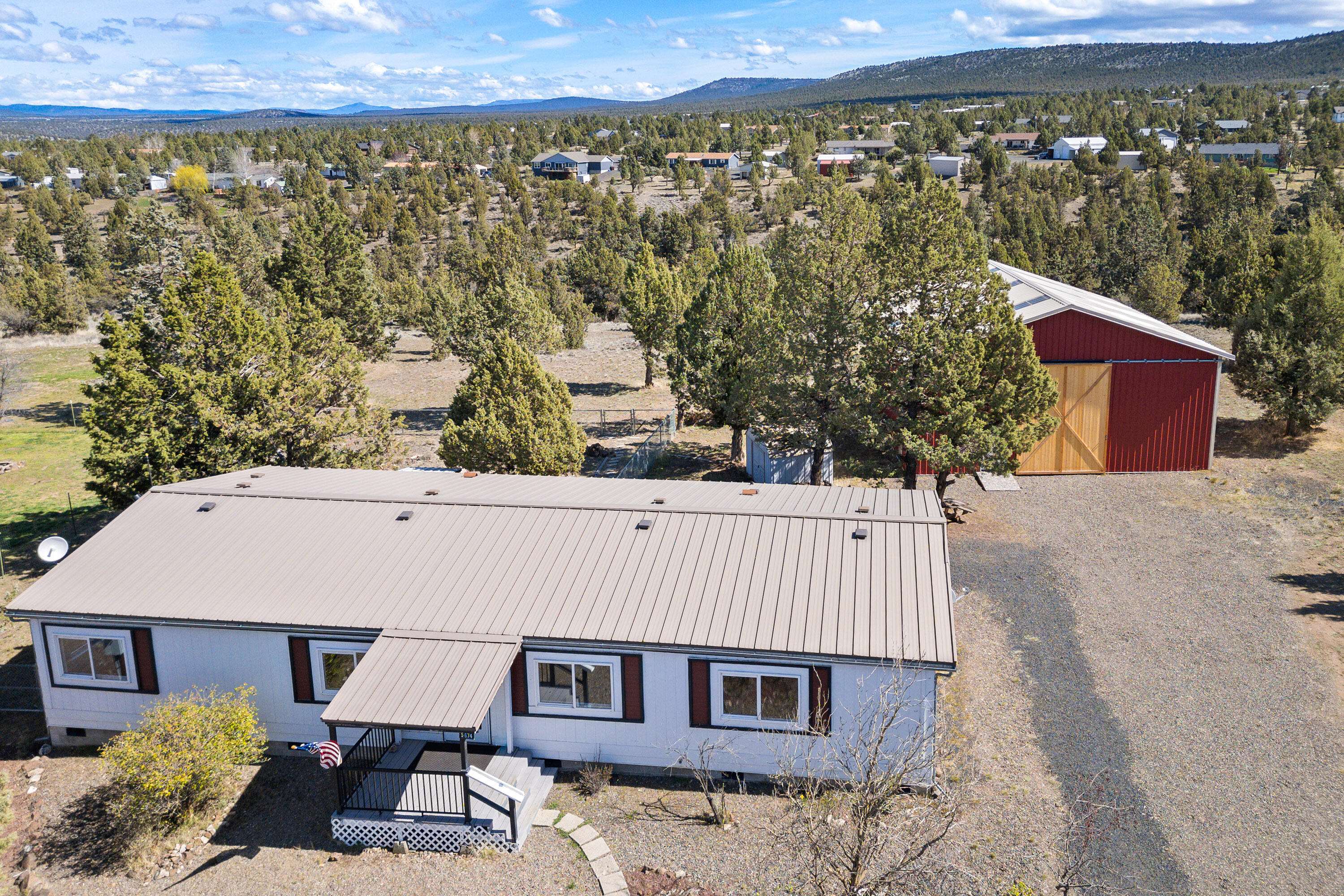 5674 Southeast Davis Loop Prineville, OR 97754 - Photo 31 of 48 an aerial view of a house with a yard