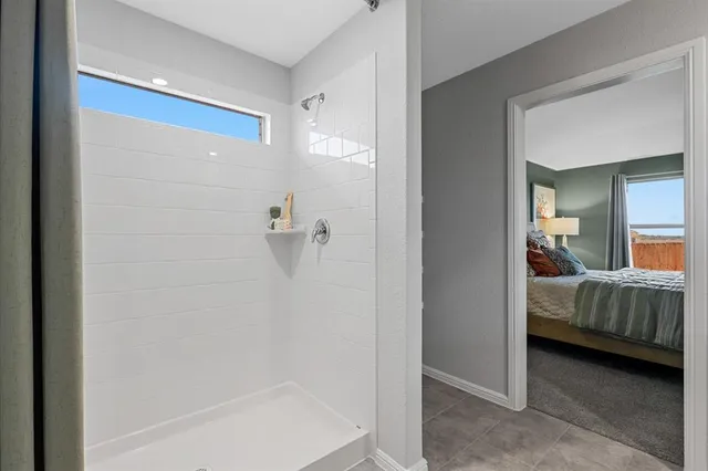 a bathroom with a sink vanity and a mirror
