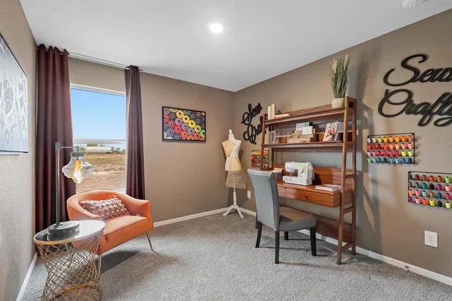 a room with furniture and a window