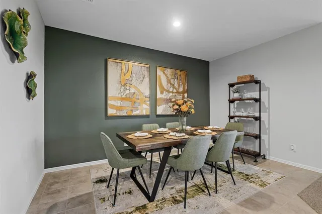a view of living room filled with furniture and window