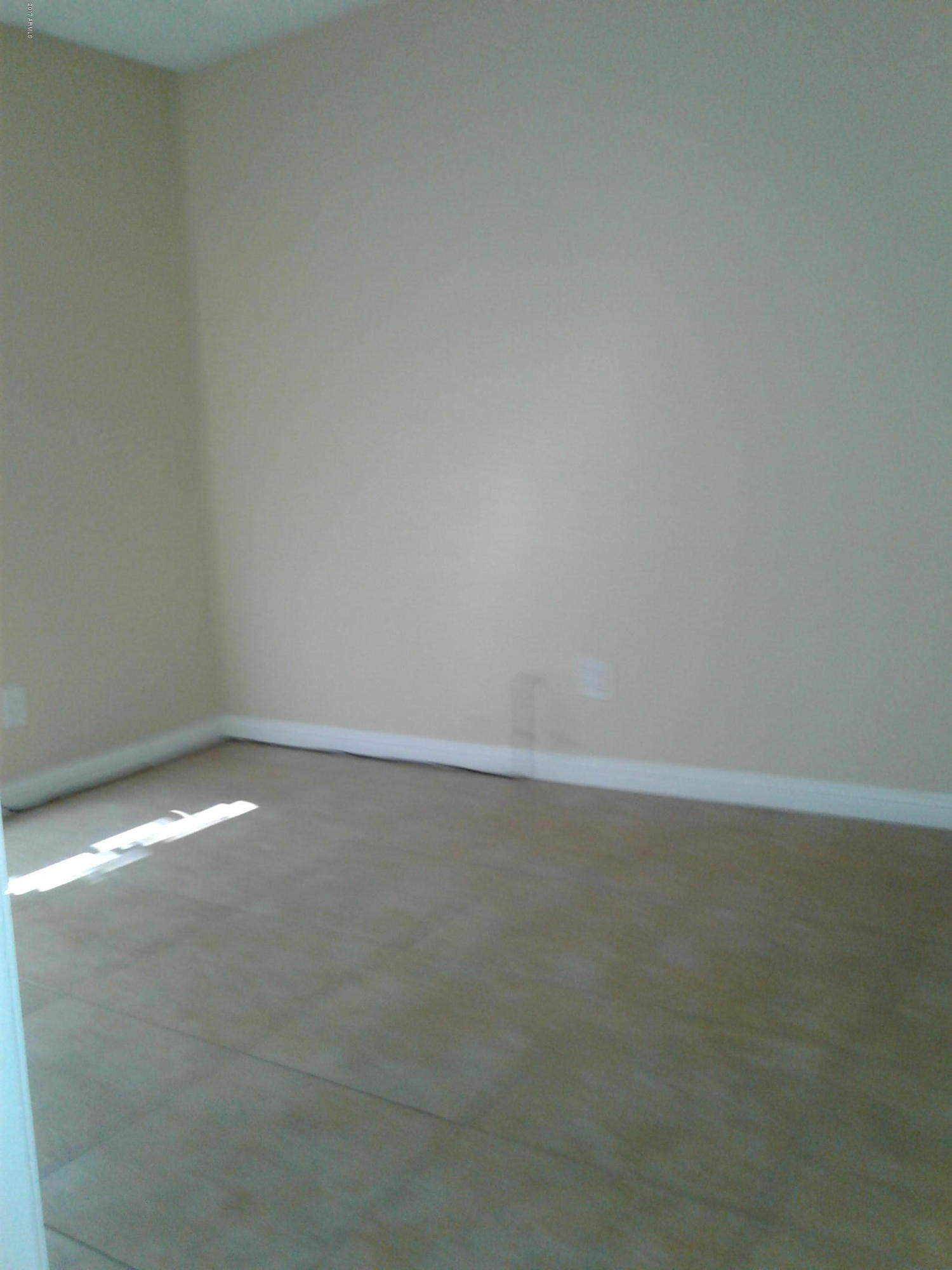8416 West Roma Avenue Phoenix, AZ 85037 - Photo 15 of 33 a view of an empty room