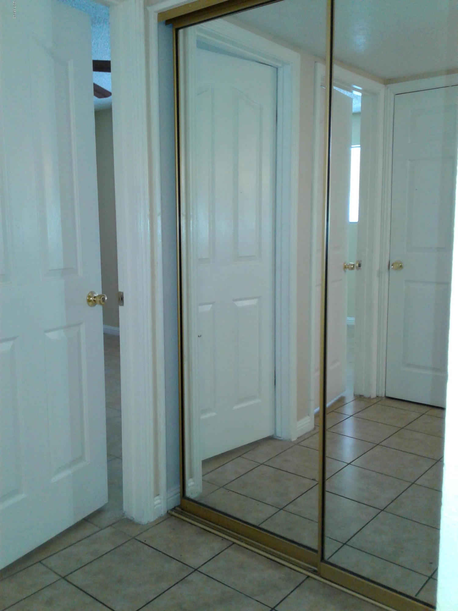 8416 West Roma Avenue Phoenix, AZ 85037 - Photo 17 of 33 a view of a elevator and an empty room
