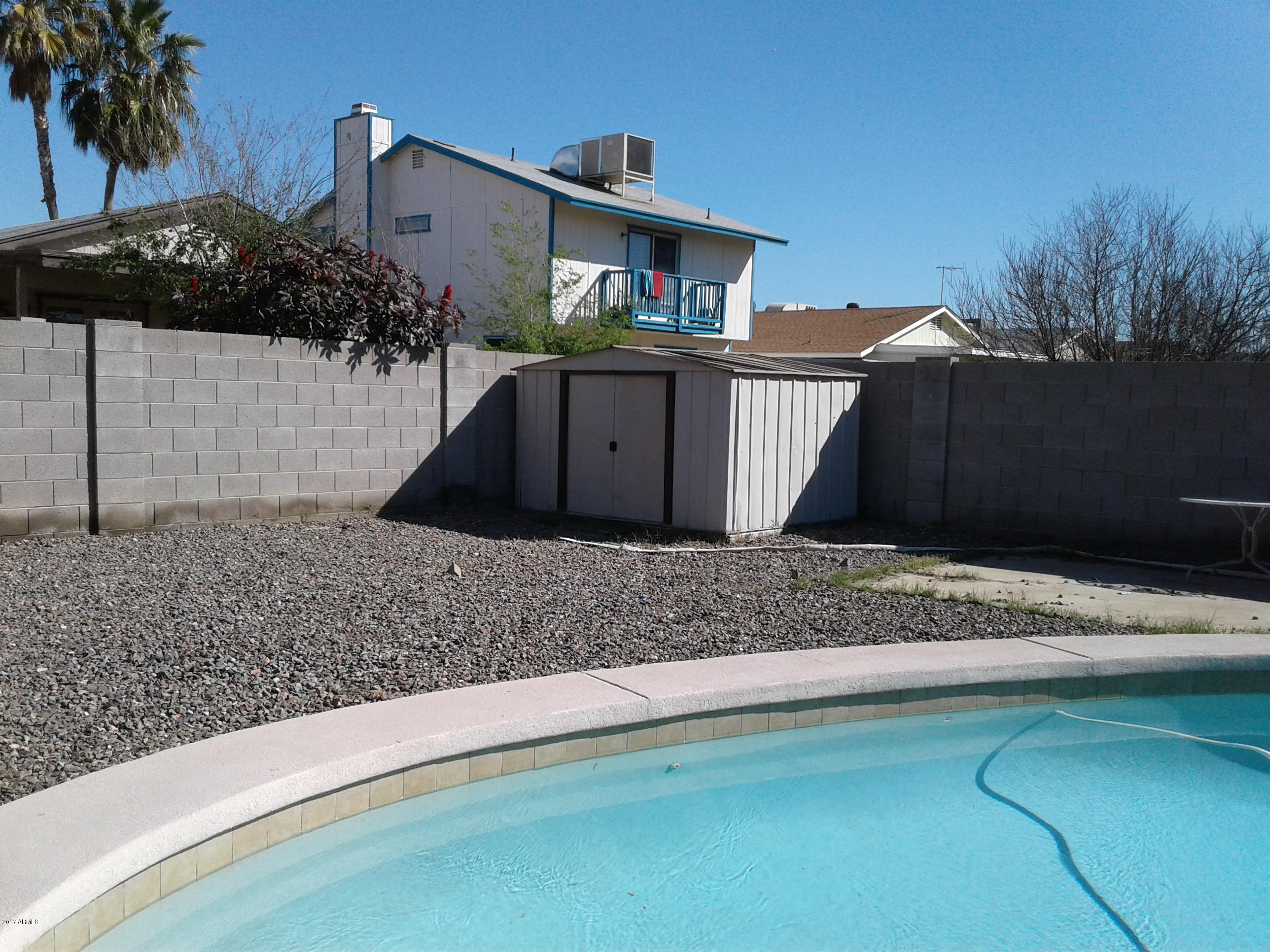 8416 West Roma Avenue Phoenix, AZ 85037 - Photo 25 of 33 a house view with a backyard space