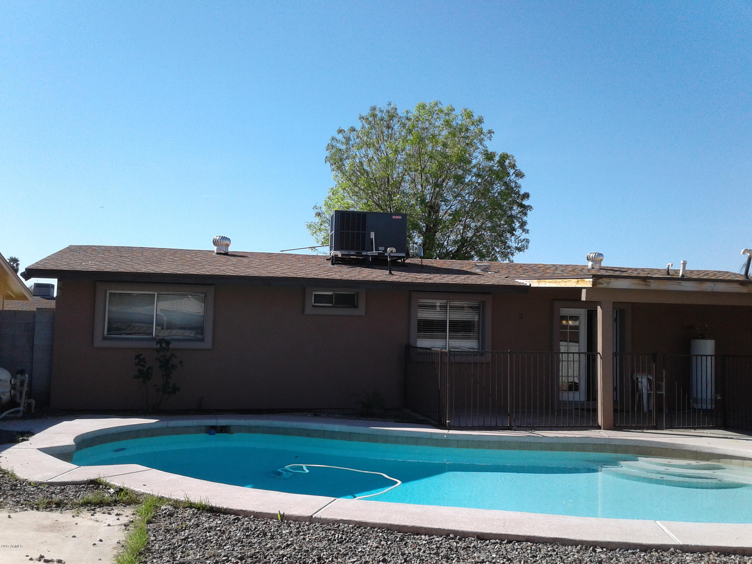 8416 West Roma Avenue Phoenix, AZ 85037 - Photo 28 of 33 a backyard of a house