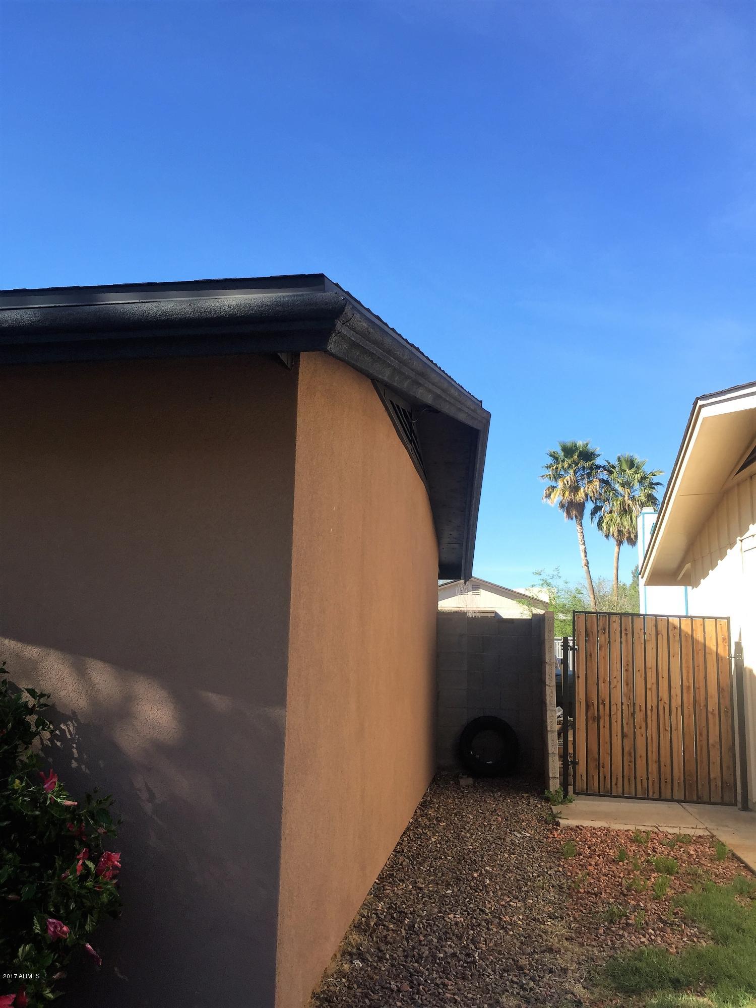 8416 West Roma Avenue Phoenix, AZ 85037 - Photo 30 of 33 a view of a garage