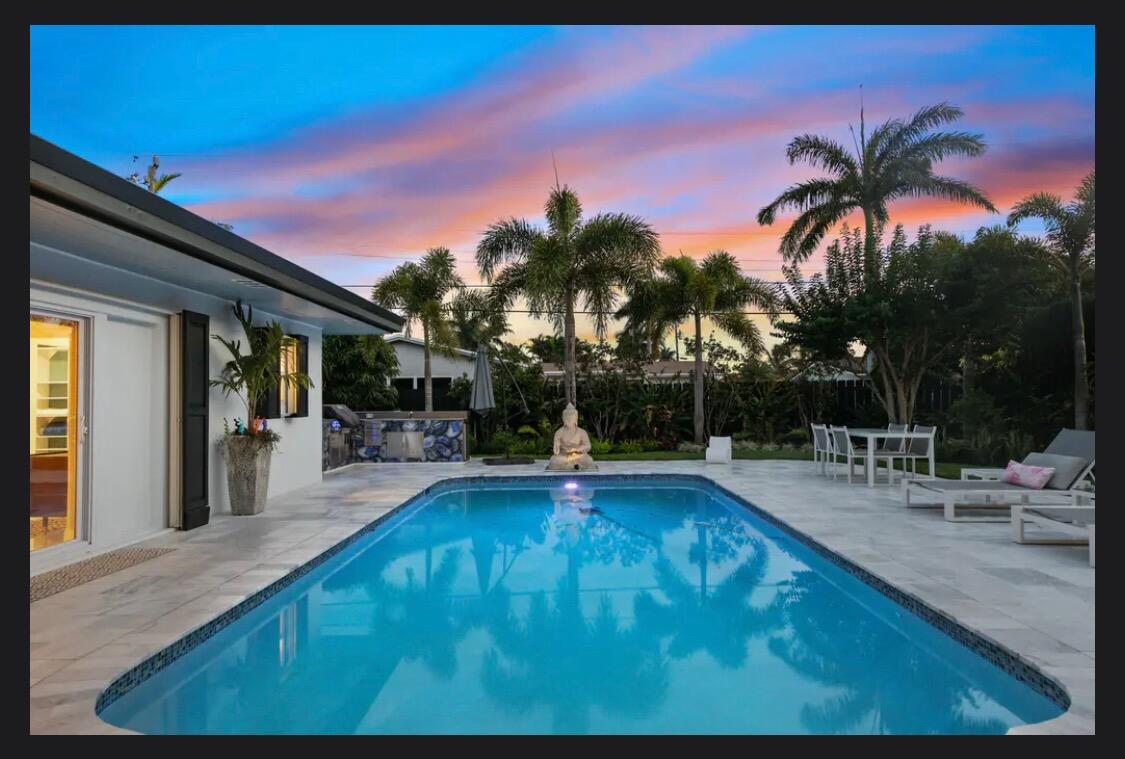 2630 Northeast 51st Court Lighthouse Point, FL 33064 - Photo 1 of 18 2630 NE 51st Ct. Backyard Pool Sunset