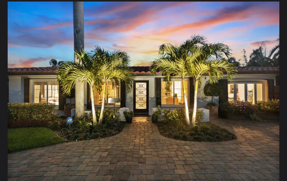 2630 Northeast 51st Court Lighthouse Point, FL 33064 - Photo 3 of 18 2630 NE 51st Ct. Front of House sunset