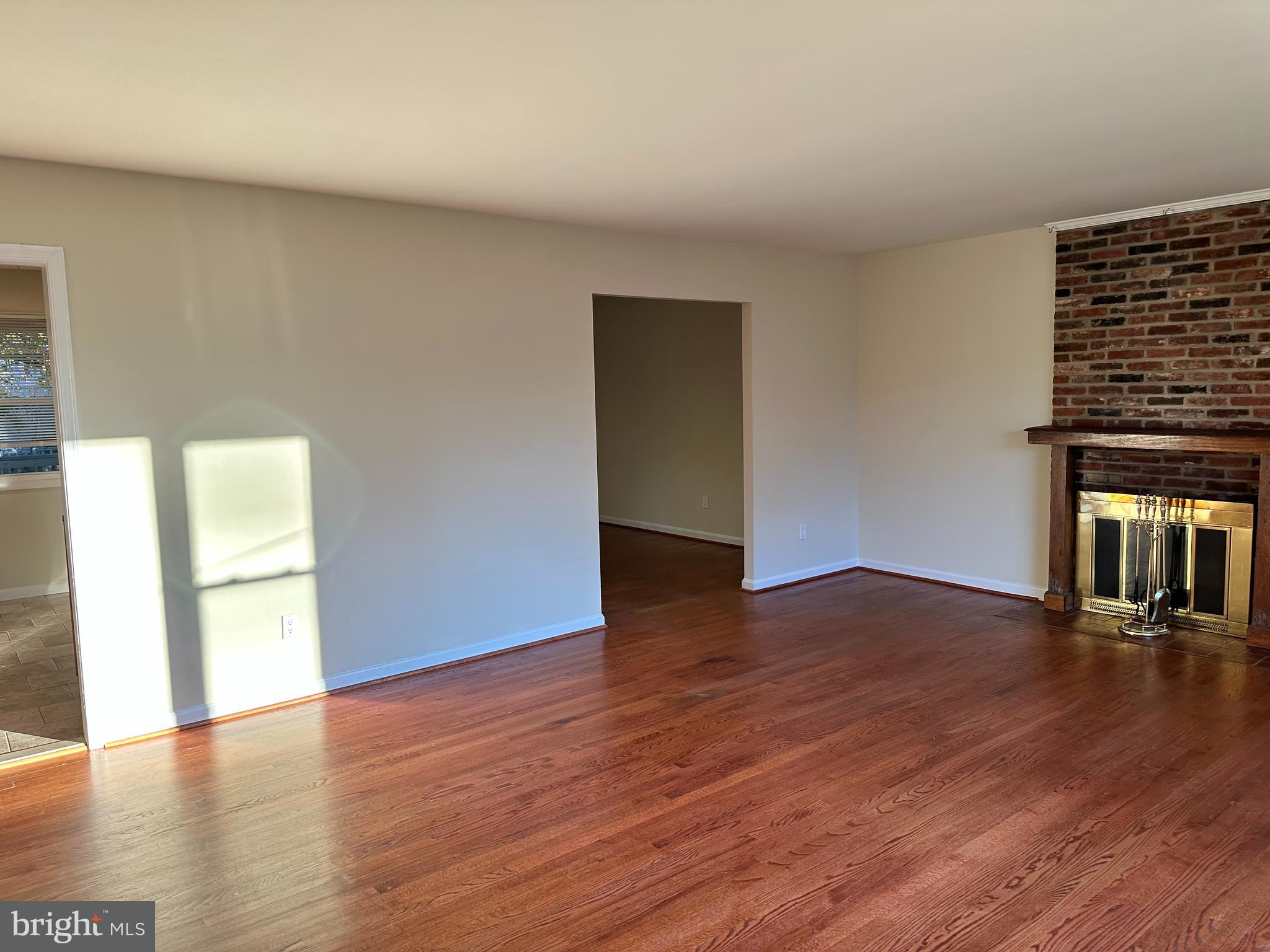 8722 Postoak Road Potomac, MD 20854 - Photo 14 of 33 Living room with entrance to Dining Room