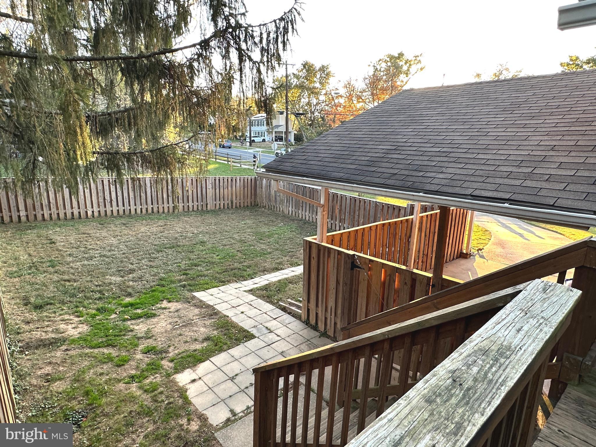 8722 Postoak Road Potomac, MD 20854 - Photo 5 of 33 Partially fenced yard