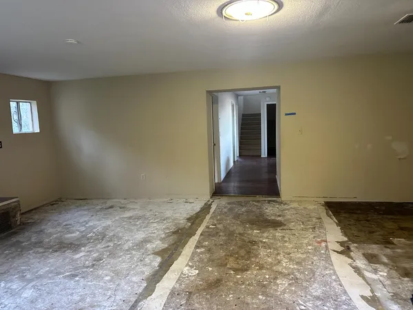 a view of a room with a staircase