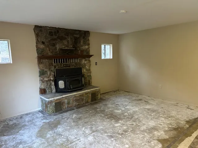 a living room with a fireplace