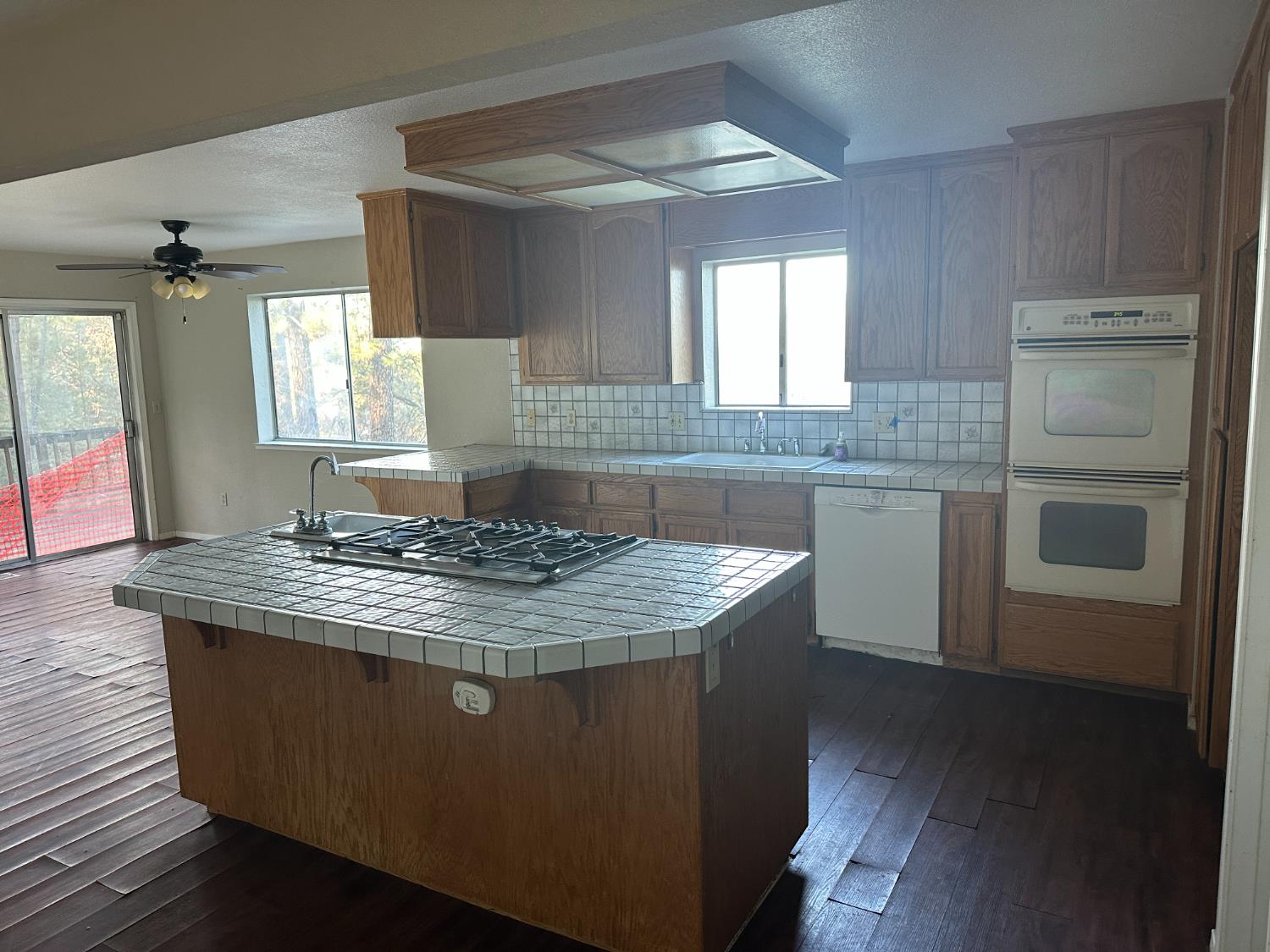 620 Schroeder Lane Colfax, CA 95713 - Photo 13 of 30 a kitchen with a stove and a sink