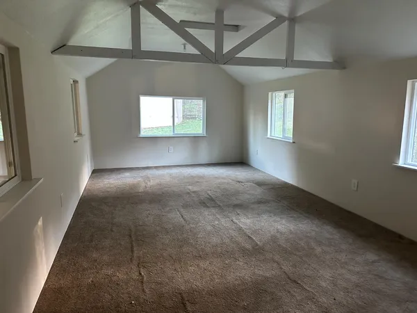 an empty room with windows