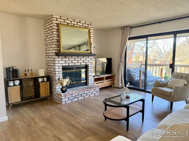 a kitchen with stainless steel appliances a stove a sink and a refrigerator