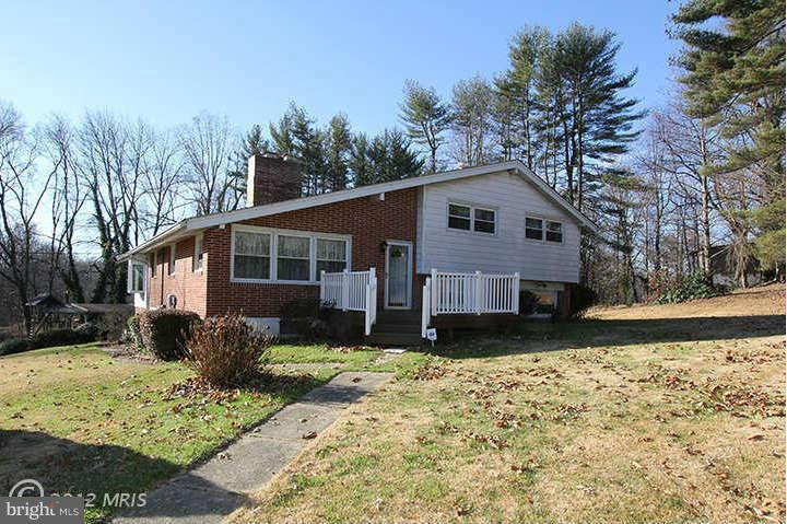 500 Whitaker Mill Road Fallston, MD 21047 - Photo 1 of 14 a front view of a house with garden