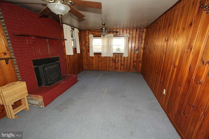 500 Whitaker Mill Road Fallston, MD 21047 - Photo 12 of 14 a view of a livingroom with furniture window and fireplace