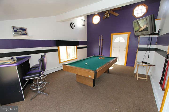 500 Whitaker Mill Road Fallston, MD 21047 - Photo 4 of 14 a room with furniture and a flat screen tv