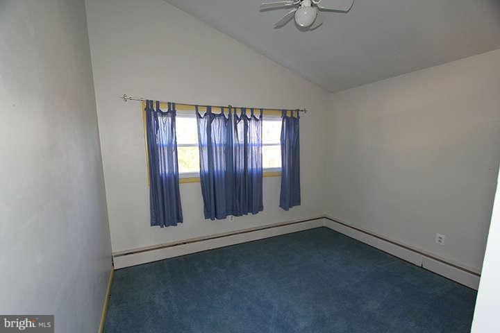 500 Whitaker Mill Road Fallston, MD 21047 - Photo 8 of 14 an empty room with windows