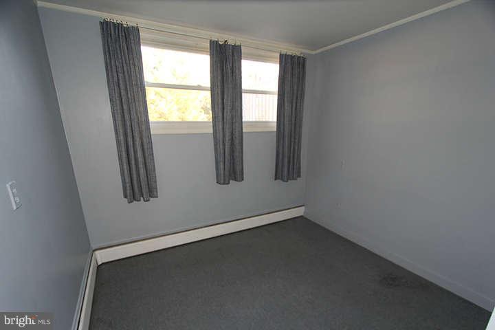 500 Whitaker Mill Road Fallston, MD 21047 - Photo 10 of 14 an empty room with windows