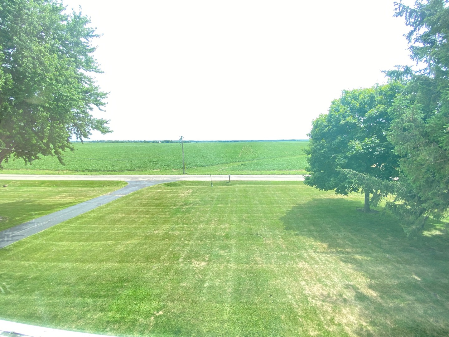 174 Kilgore Road Dixon, IL 61021 - Photo 2 of 55 a view of a golf course with a lake