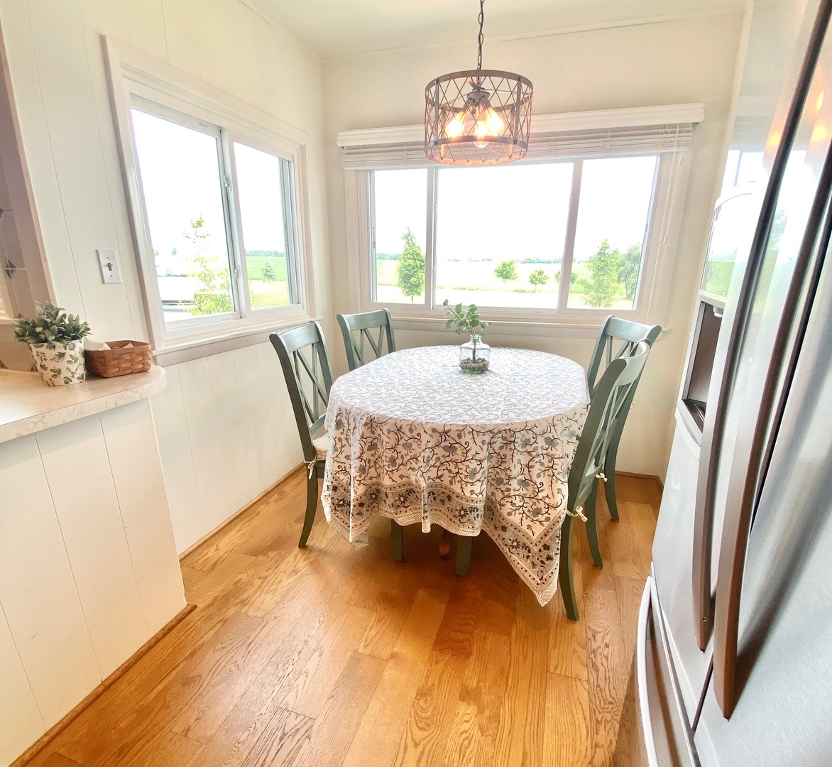 174 Kilgore Road Dixon, IL 61021 - Photo 22 of 55 a view of a dining room with furniture window and wooden floor