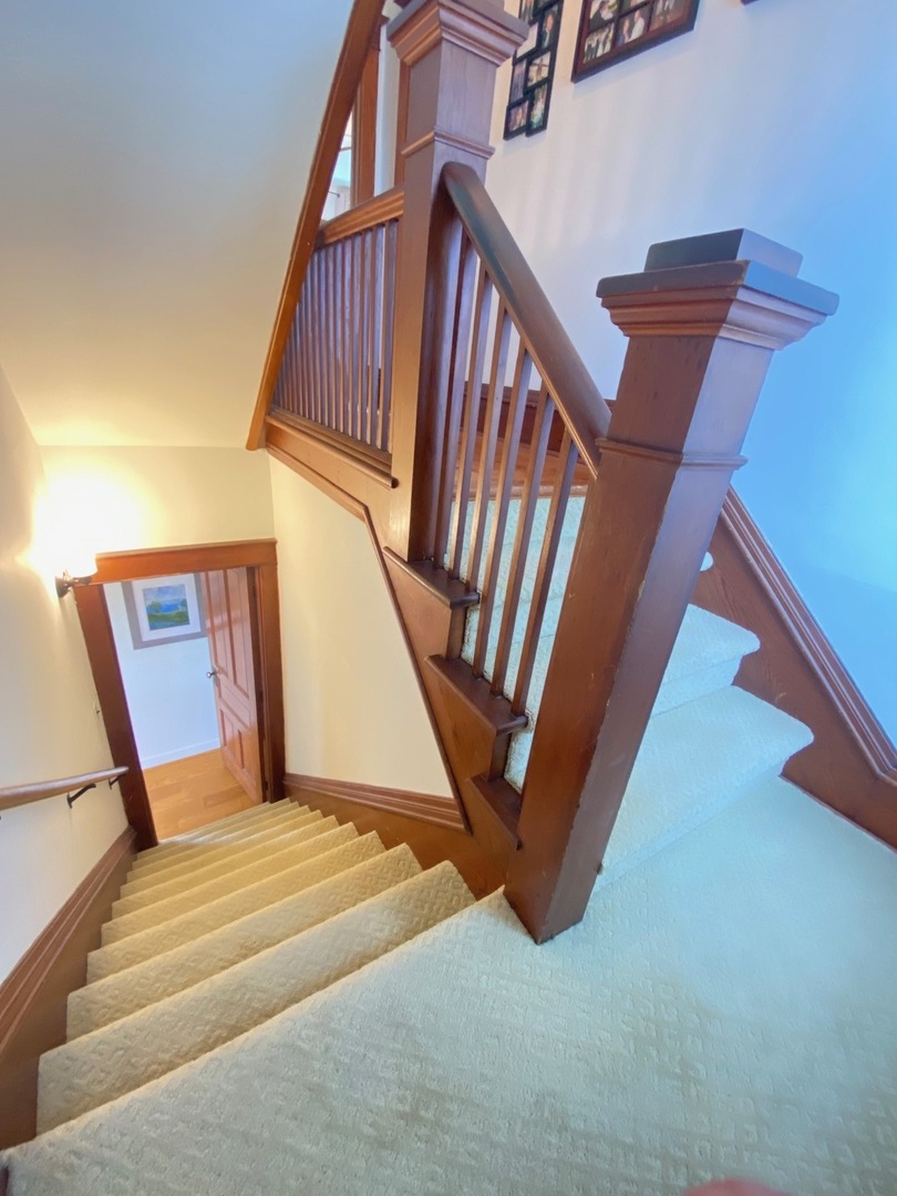 174 Kilgore Road Dixon, IL 61021 - Photo 28 of 55 a view of staircase with railing and white walls