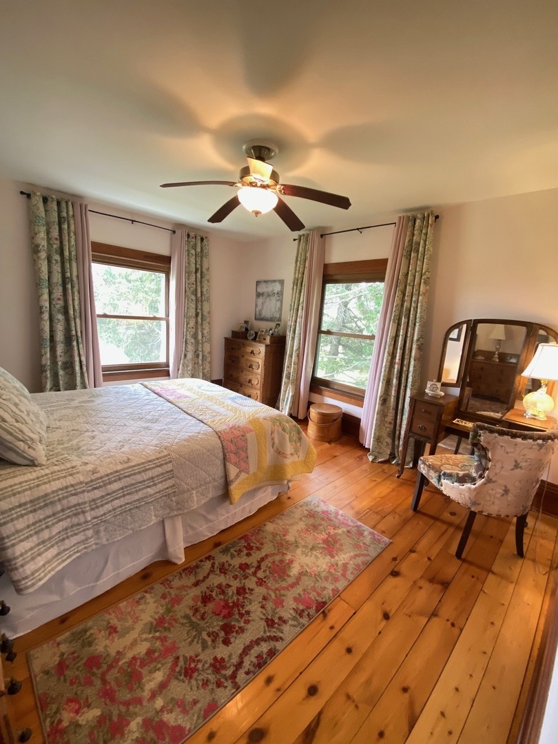 174 Kilgore Road Dixon, IL 61021 - Photo 32 of 55 a bedroom with a bed a flat screen tv and a window